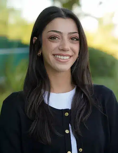 Photo of Danielle Hanna, Social Media Manager at Balikian Facial Plastic Surgery, smiling in a professional setting, representing the creative voice behind the practice’s online presence.