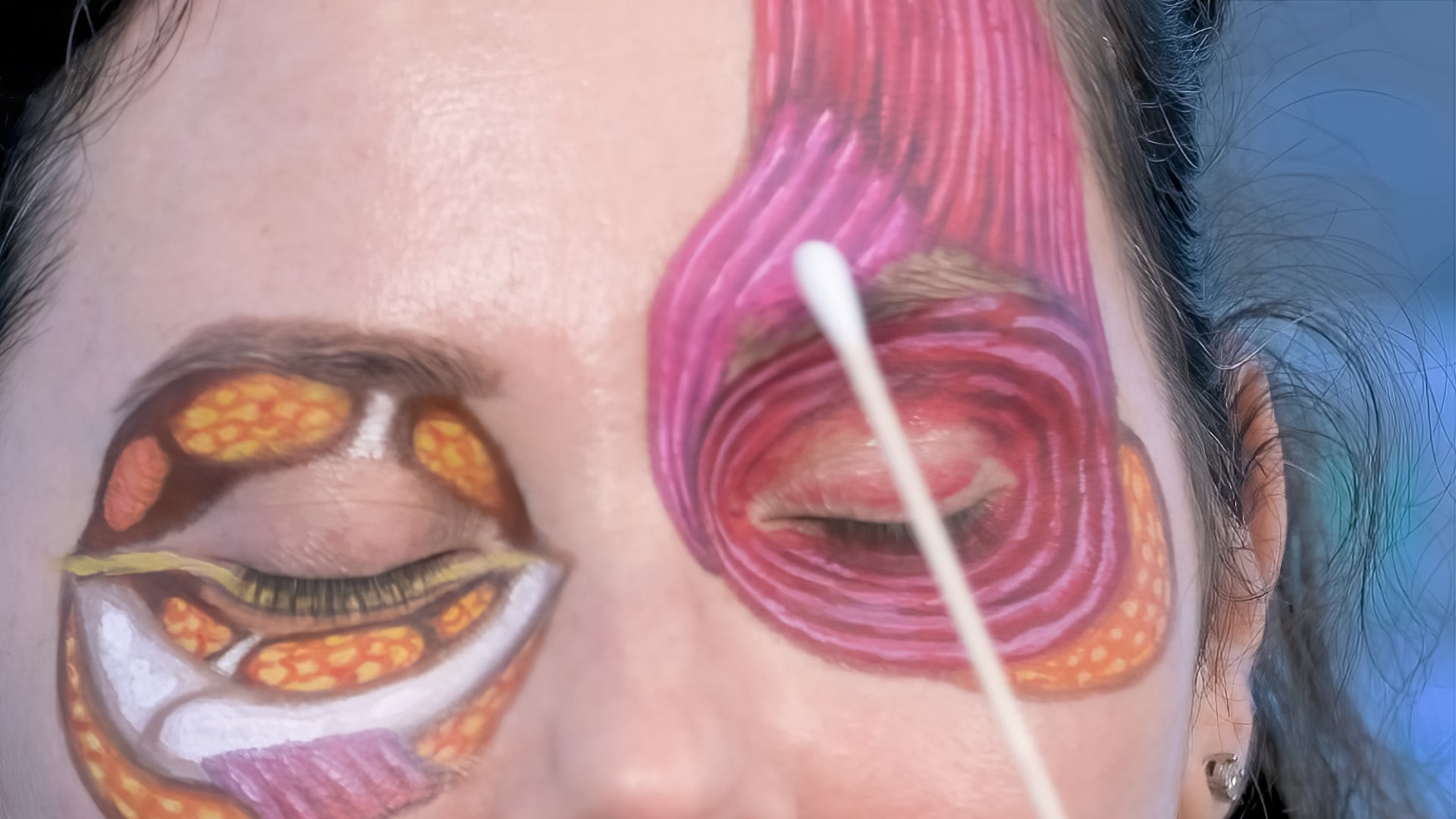 Illustration of the orbicularis oculi muscle surrounding the eye and forehead demonstrating the muscle layer involved in modern blepharoplasty