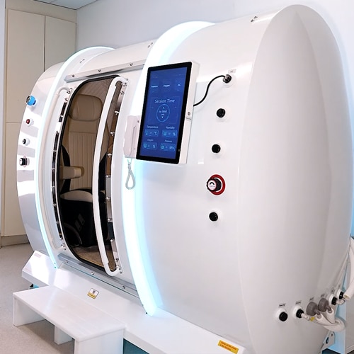 Hyperbaric Oxygen Therapy (HBOT) chamber used to support healing and recovery after facelift, neck lift, blepharoplasty, and other facial plastic surgery procedures.